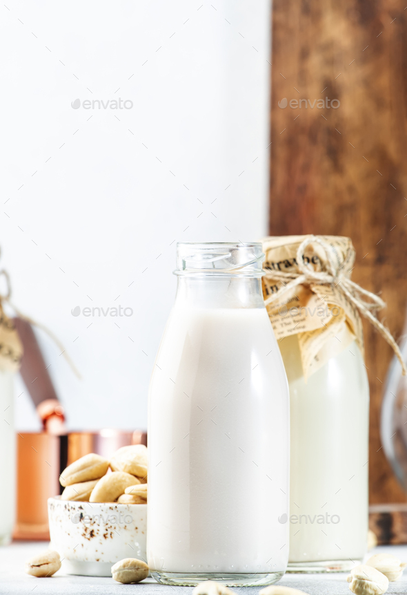 Cashew nut milk in bottles - Stock Photo - Images