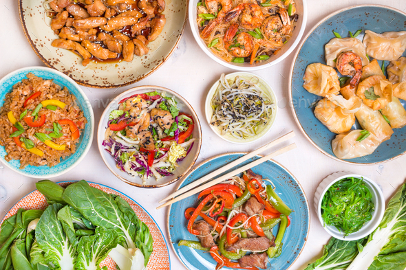 Chinese food on a white table - Stock Photo - Images