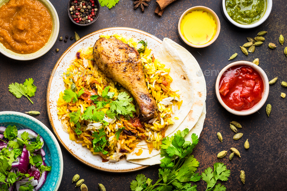 Biryani chicken and indian dishes - Stock Photo - Images