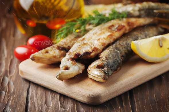 Traditional russian fish smelt on the wooden table Stock Photo by ...