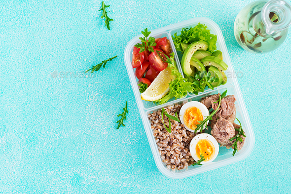 Lunch- Buckwheat porridge, sliced tuna, boiled egg and fresh vegetable salad - Stock Photo - Images