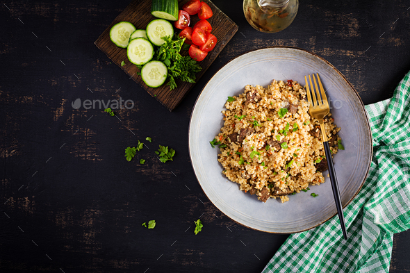 Bulgur pilaf with meat and and vegetables. - Stock Photo - Images