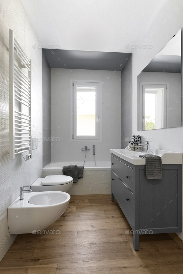 Interiors of a Modern Bathroom With Wood Floor - Stock Photo - Images