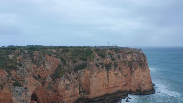 Sensational Aerial Drone View Flying Above Lagos Portugal Coastline Cloudy Day Flying Forward alt