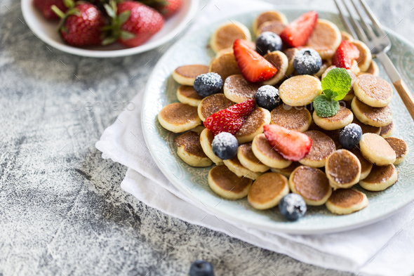 Tiny pancakes for breakfast. Cereal pancakes - Stock Photo - Images