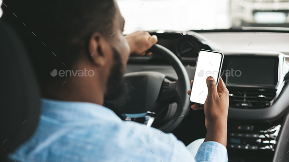 Unrecognizable Black Driver Using Mobile Phone Sitting In Automobile, Mockup