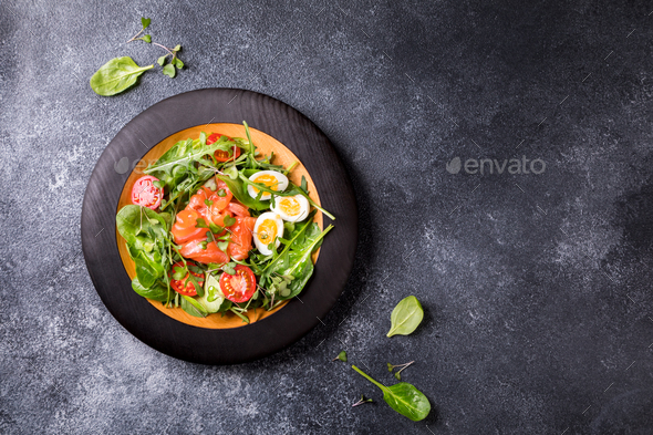 Salmon Salad with Vitamins in vegetables and herbs - Stock Photo - Images