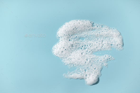 Foam with bubbles. Soap sud on blue background. - Stock Photo - Images