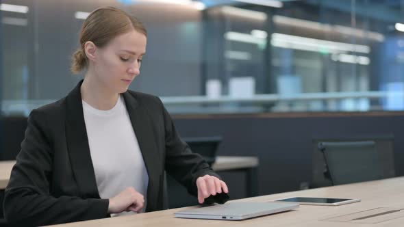 Woman Coming Back Opening Laptop in Office alt