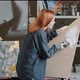 Talented Red Hair Caucasian Millennial Woman Painter Female Hand Artist Girl Paints Draws Creating - VideoHive Item for Sale