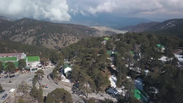Aerial View in Troodos Mountains on Cyprus in Spring Day, Snow Is Lying on Ground
