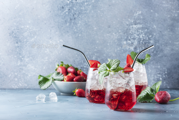 Red cocktail with ice and fresh strawberry - Stock Photo - Images