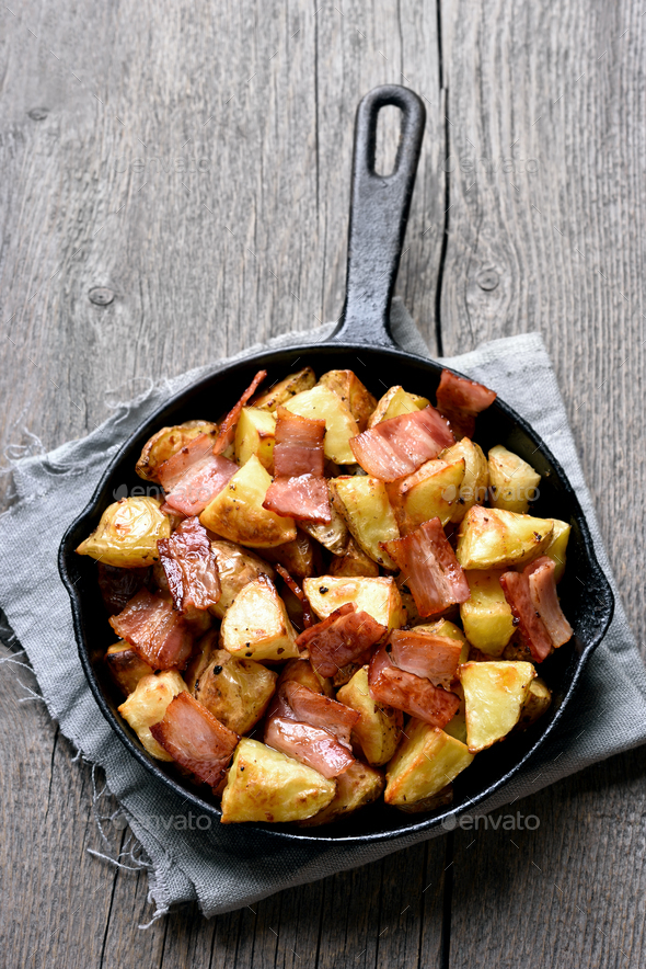 Fried potatoes with bacon Stock Photo by voltan1 | PhotoDune