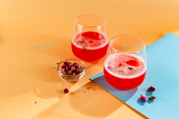 Pink Raspberry Cocktail in drink glass - Stock Photo - Images