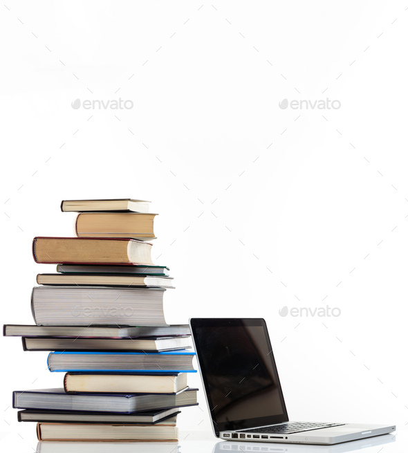 Elearning, books stack and a laptop isolated on white background - Stock Photo - Images