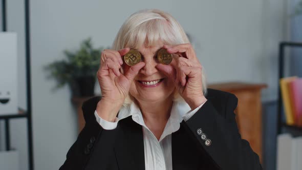 Elderly Businesswoman Showing Golden Bitcoins BTC Money Mining Investment Wealth Earning Income alt