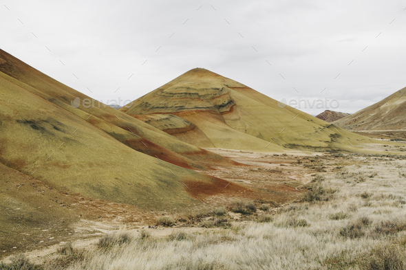 The Painted Hills desert and landscape, coloured layered geological strata in the John Day Fossil - Stock Photo - Images
