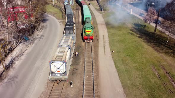 Cargo train in industrial zone alt