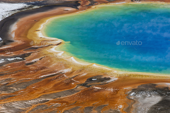 Grand Prismatic Spring, a bright turquoise pool and site of geothermal activity, with mineral rich