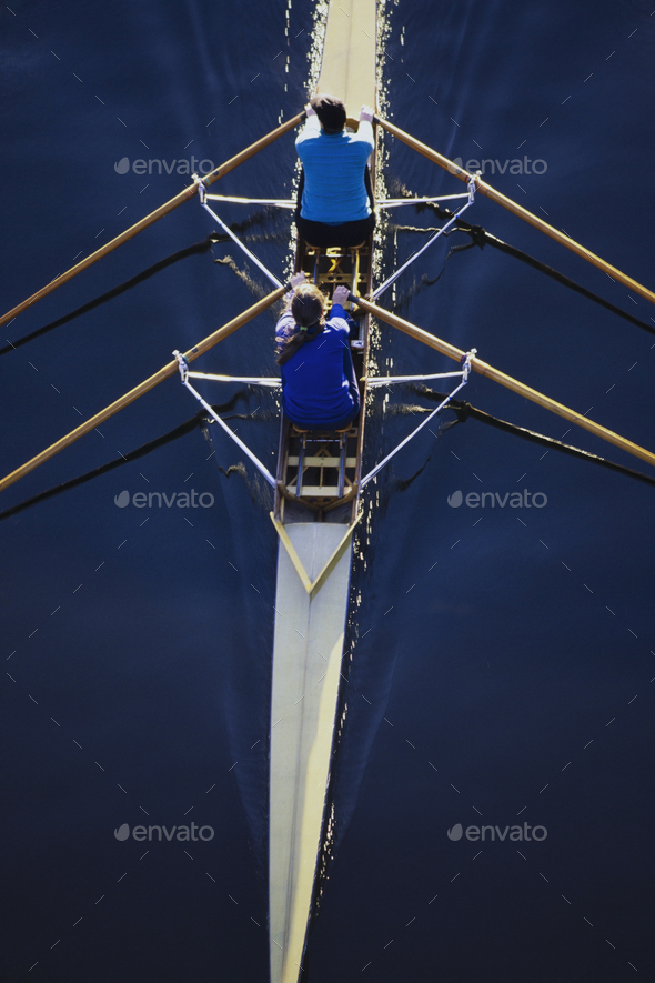 Overhead view of women rowing double scull boat during competitive race in Seattle.