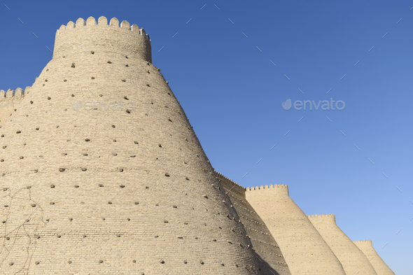 Wall of the Bukhara Fortress, the Ark in Bukhara with tapering high walls.