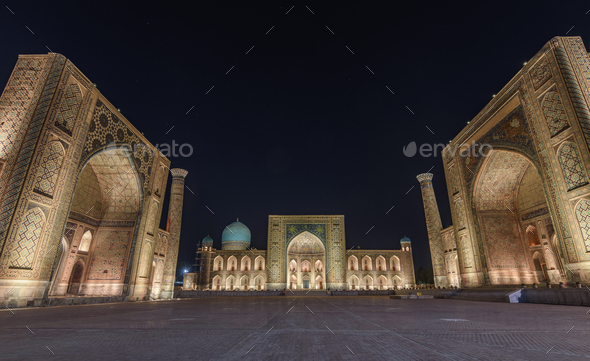 Registan Square at night, with imposing Madrasa buildings, Ulugh Beg Madrasah, Sher-Dor Madrasah and - Stock Photo - Images