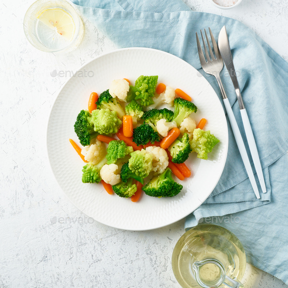Mix of boiled vegetables. Broccoli, carrots, cauliflower. Steamed vegetables for diet - Stock Photo - Images