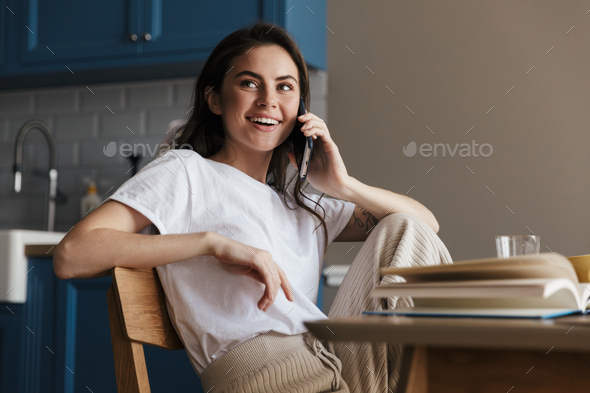 Attractive young brunette woman - Stock Photo - Images