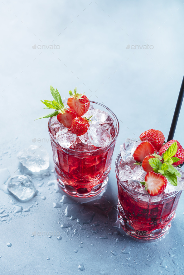 Red cocktail with ice and mint - Stock Photo - Images
