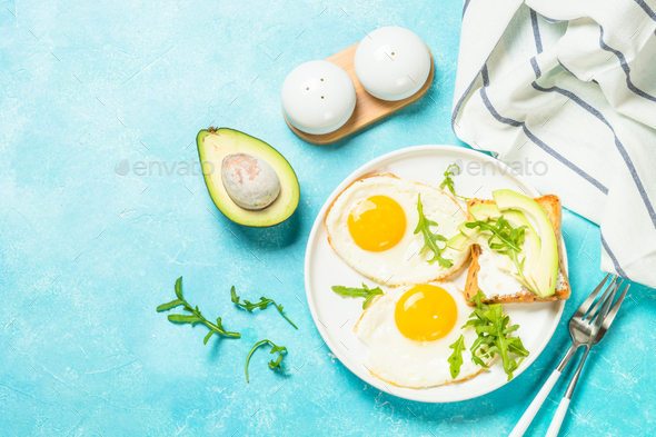 Healthy breakfast with egg, toast and salad - Stock Photo - Images