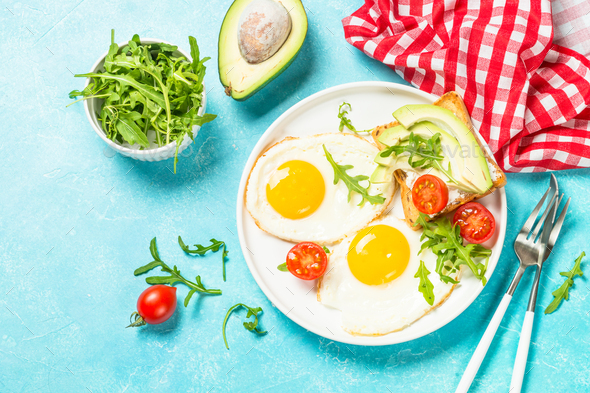 Healthy breakfast with egg, toast and salad - Stock Photo - Images