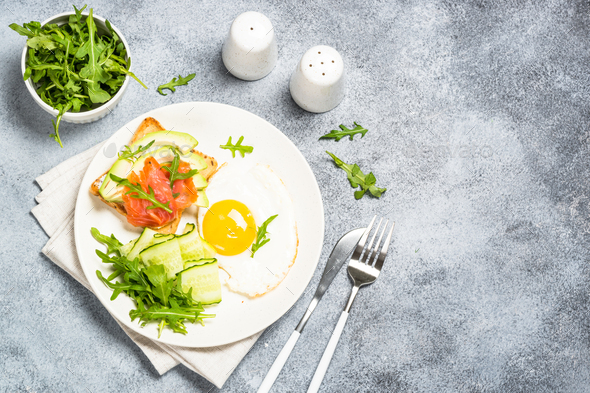 Healthy breakfast with egg, toast and salad - Stock Photo - Images
