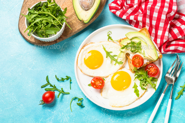 Healthy breakfast with egg, toast and salad - Stock Photo - Images