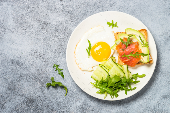 Healthy breakfast with egg, toast and salad - Stock Photo - Images