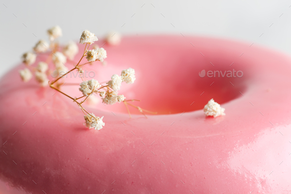 Close up view glazed surface of homemade souffle from strawberry fruits with plant twig for - Stock Photo - Images