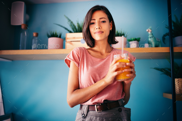 Woman drinking fresh raw juice. Healthy Lifestyle
