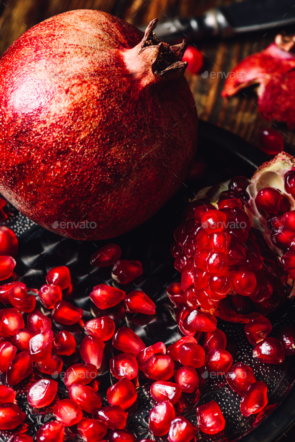 Pomegranate with Ruby Seeds - Stock Photo - Images