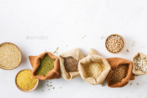 Various kinds of natural grains and cereals in fabric bags