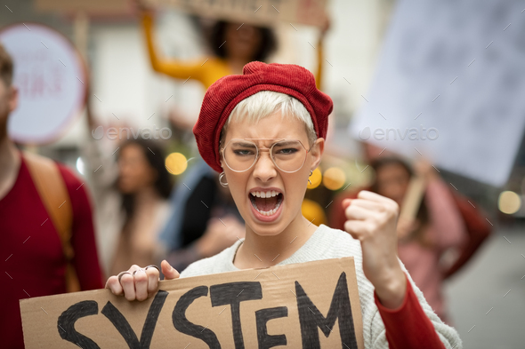 Angry woman in protest march for her rights - Stock Photo - Images