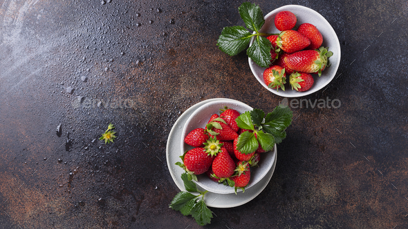 Fresh strawberry with a green leaves - Stock Photo - Images