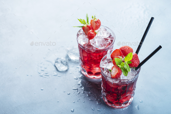 Red cocktail with ice and mint - Stock Photo - Images