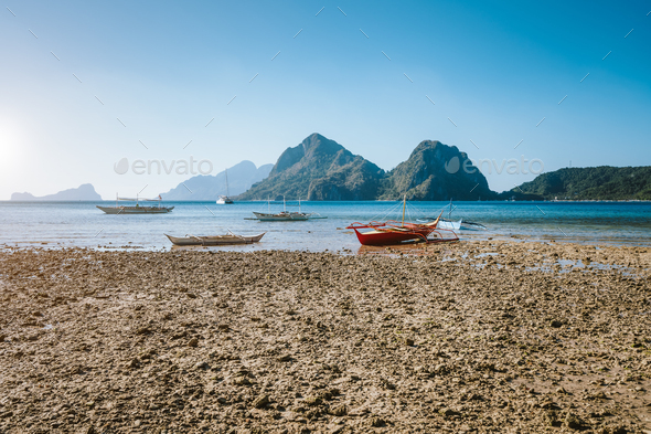 El Nido Palawan Philippines Local Fishing Boats During Low Tide At Las Cabanas Beach With Amazing Stock Photo By Shunga Shanga