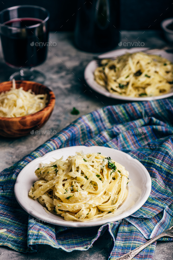 Two Portions of Homemade Pasta Alfredo - Stock Photo - Images