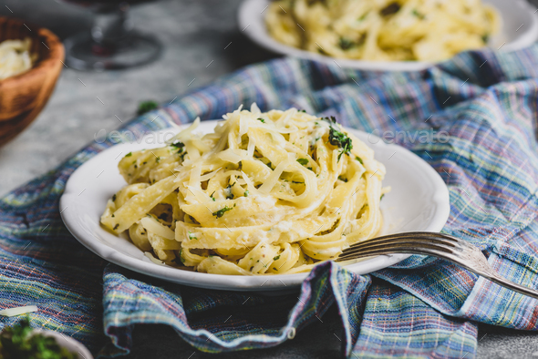 Homemade Fettuccine Pasta with Alfredo Sauce on Plate - Stock Photo - Images