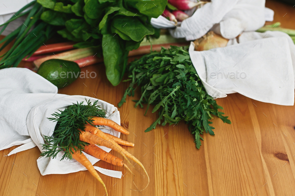 Zero waste grocery shopping concept. Reusable eco friendly bags with fresh vegetables - Stock Photo - Images
