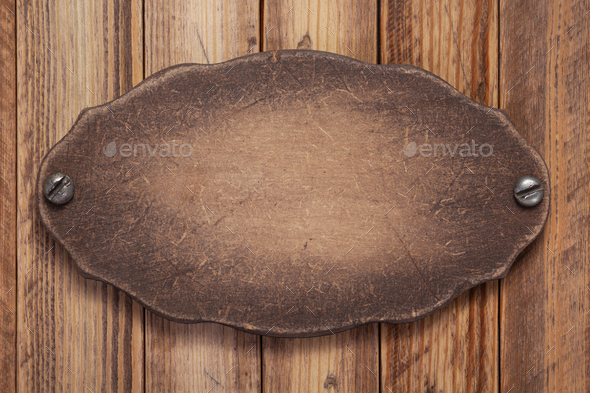 nameplate or wall sign board at wooden background Stock Photo by seregam