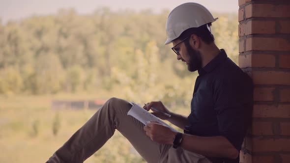 Architector Inspecting Building.Engineer On Building Constructor Job.Developer Builder Contractor. alt