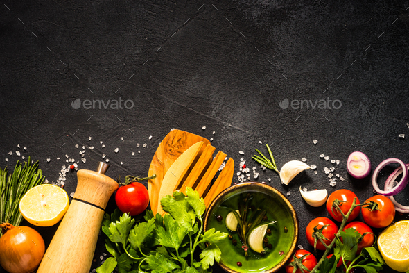 Food cooking background on black kitchen table Stock Photo by Nadianb