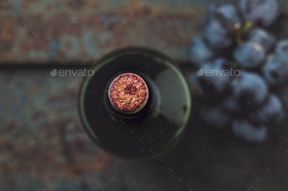 Top view of red wine bottle. Macro, selective focus on wine cork - Stock Photo - Images