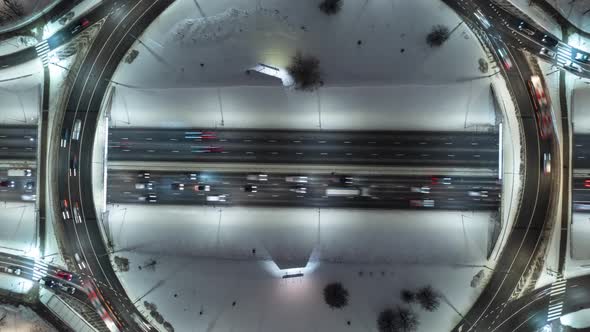 Beautiful Top View Winter Hyperlapse of Car Traffic at Roundabout Lane - Urban Cityscape Concept